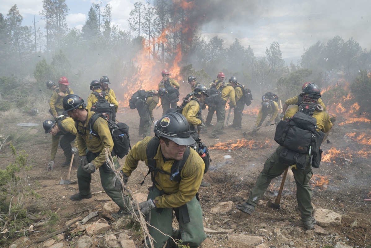 "Supe" Eric Marsh (Josh Brolin) orders his Granite Mountain Hotshots to cut a safe zone now at the Yarnell Hills Box Canyon.