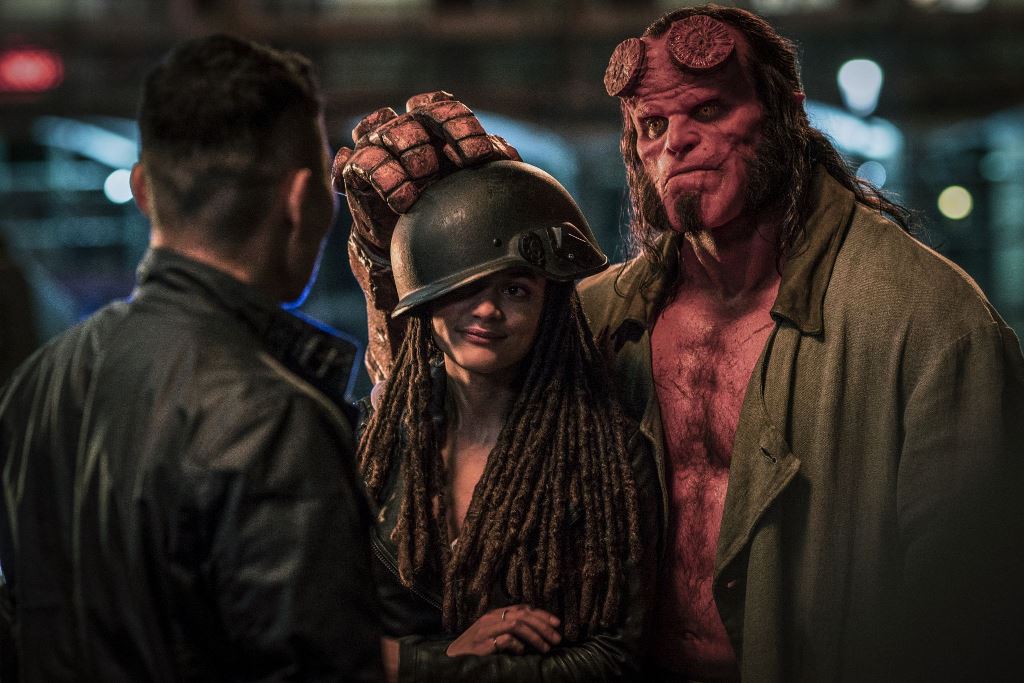 Daniel Day Kim as 'Ben Daimio', Sasha Lane as 'Alice Monoghan', and David Harbour as 'Hellboy' in HELLBOY. Photo Credit: Mark Rogers.